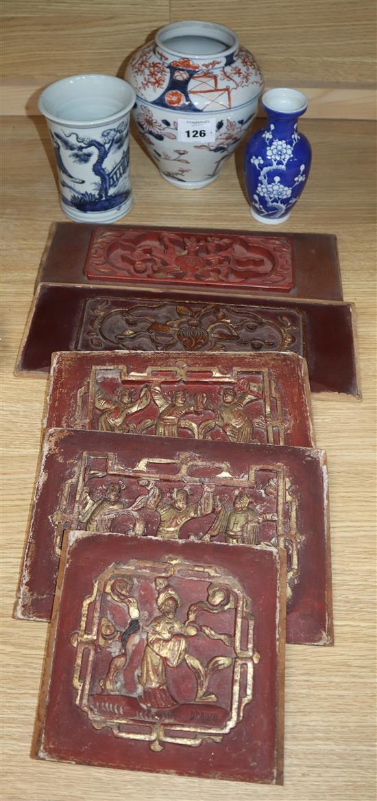 Three Oriental vases and five Chinese carved wood panels